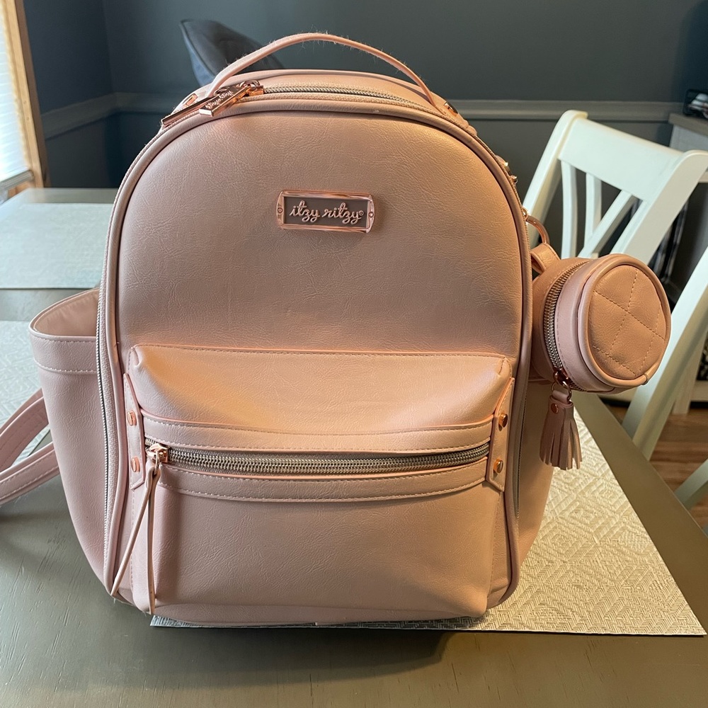 Itzy ritzy mini diaper bag with charm pod